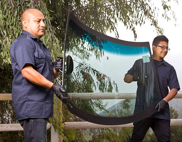 Expert Glass auto glass photo – Curved windshield install